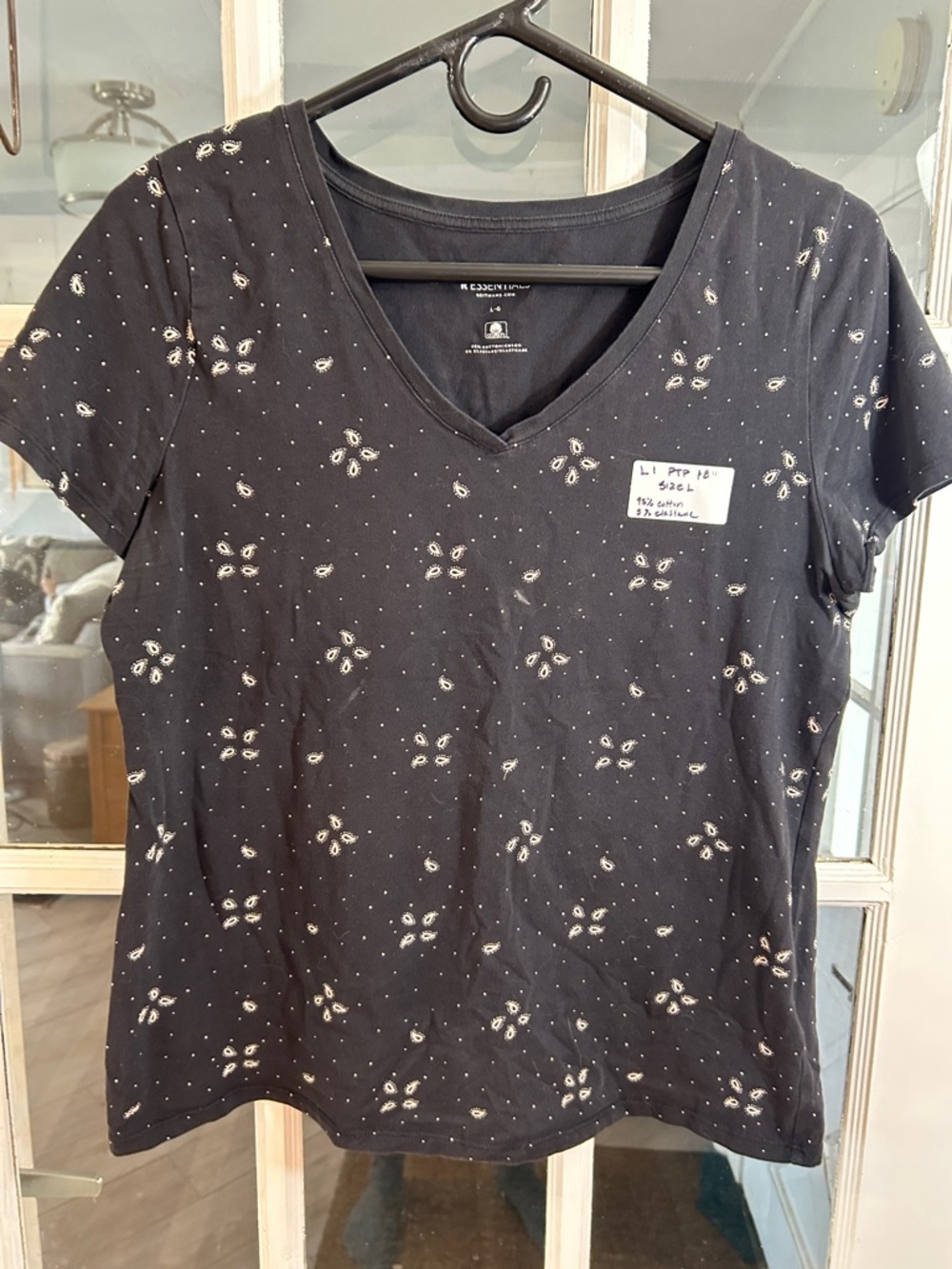 L1.   Reitmans Black V-Neck Short Sleeve Tee with Tiny Cream Floral Print